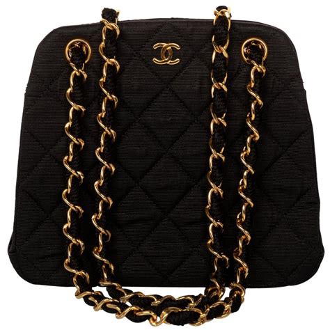 black bag chanel|black chanel bag with gold chain.